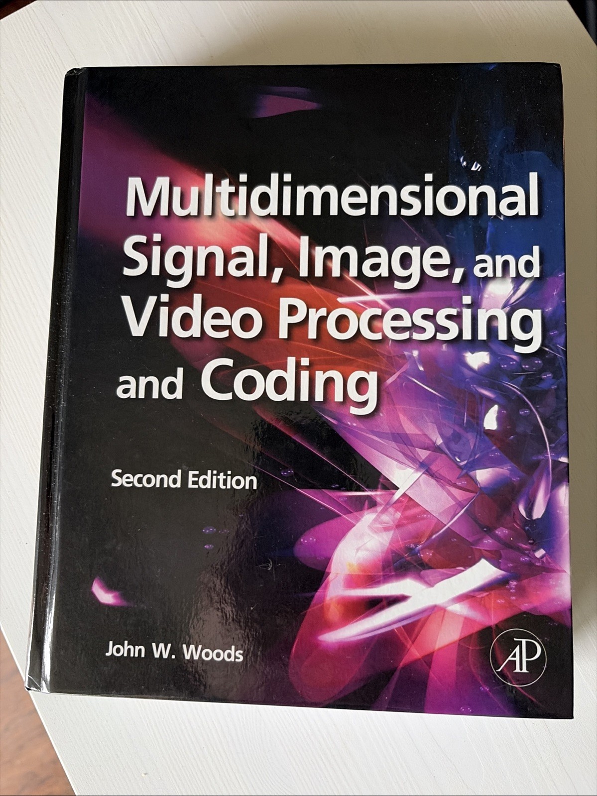MULTIDIMENSIONAL SIGNAL, IMAGE, AND VIDEO PROCESSING AND By John W. Woods.