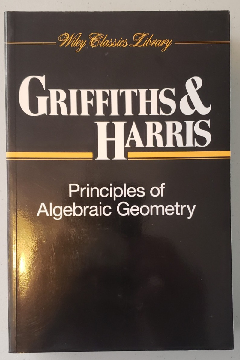 Principles of Algebraic Geometry by Joseph Harris & Phillip Griffiths