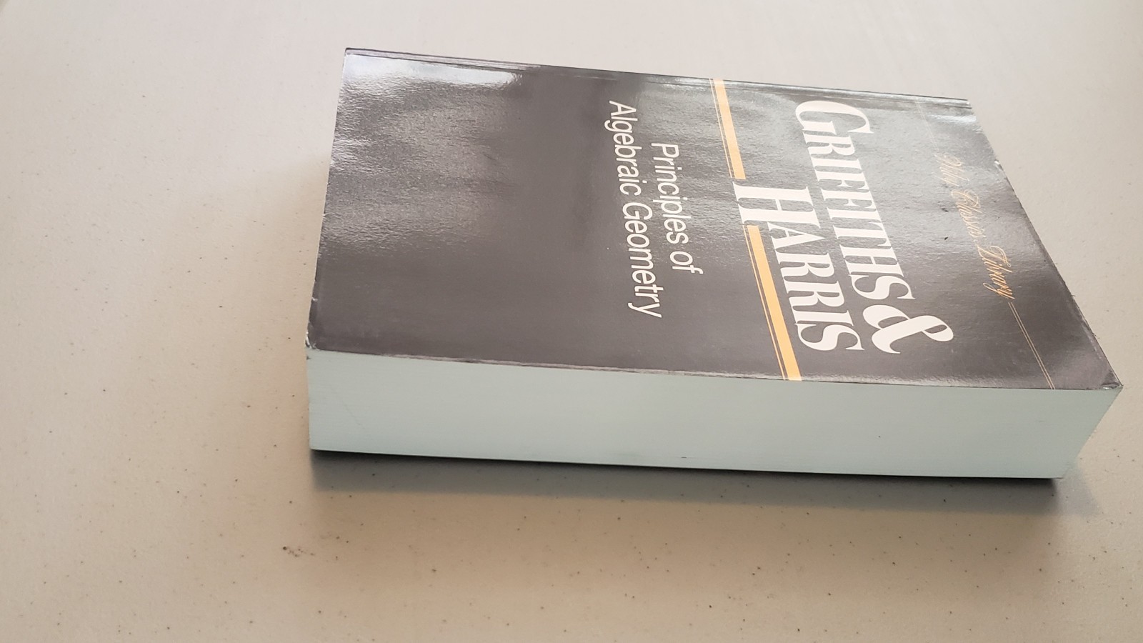 Principles of Algebraic Geometry by Joseph Harris & Phillip Griffiths
