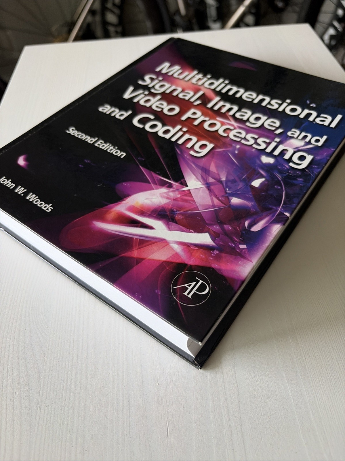 MULTIDIMENSIONAL SIGNAL, IMAGE, AND VIDEO PROCESSING AND By John W. Woods.