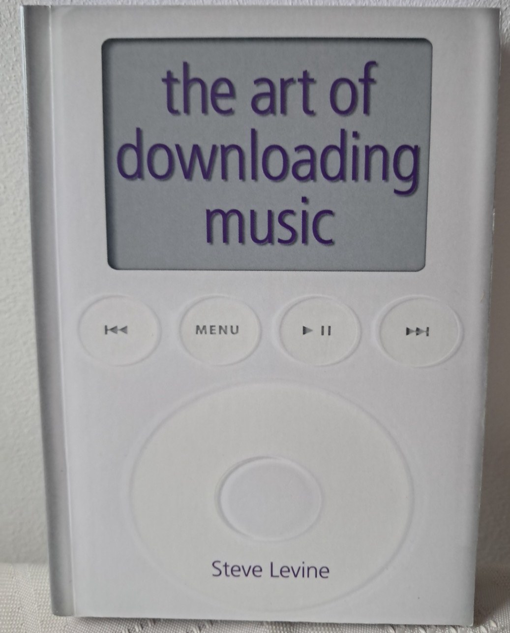 STEVE LEVINE – THE ART OF DOWNLOADING MUSIC P/B BRAND NEW £4.99