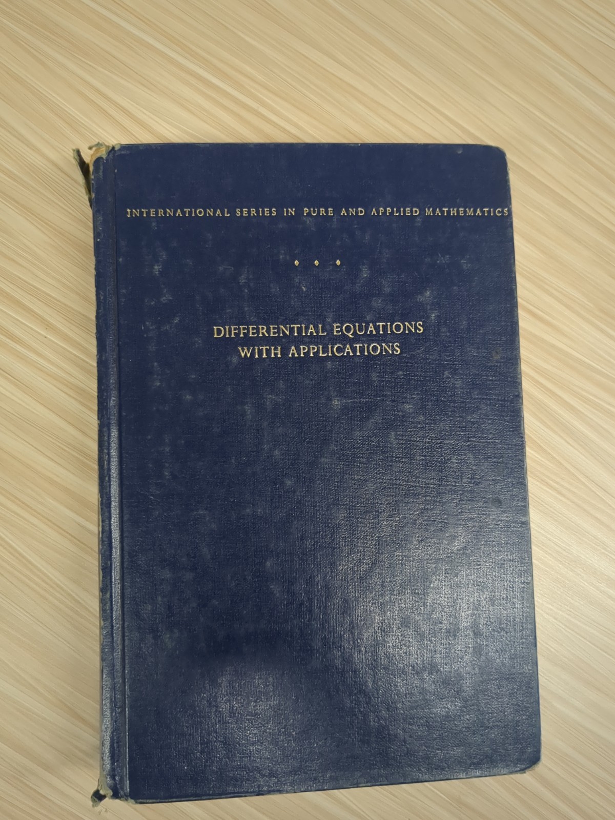Differential equations,: With applications and historical notes (International,
